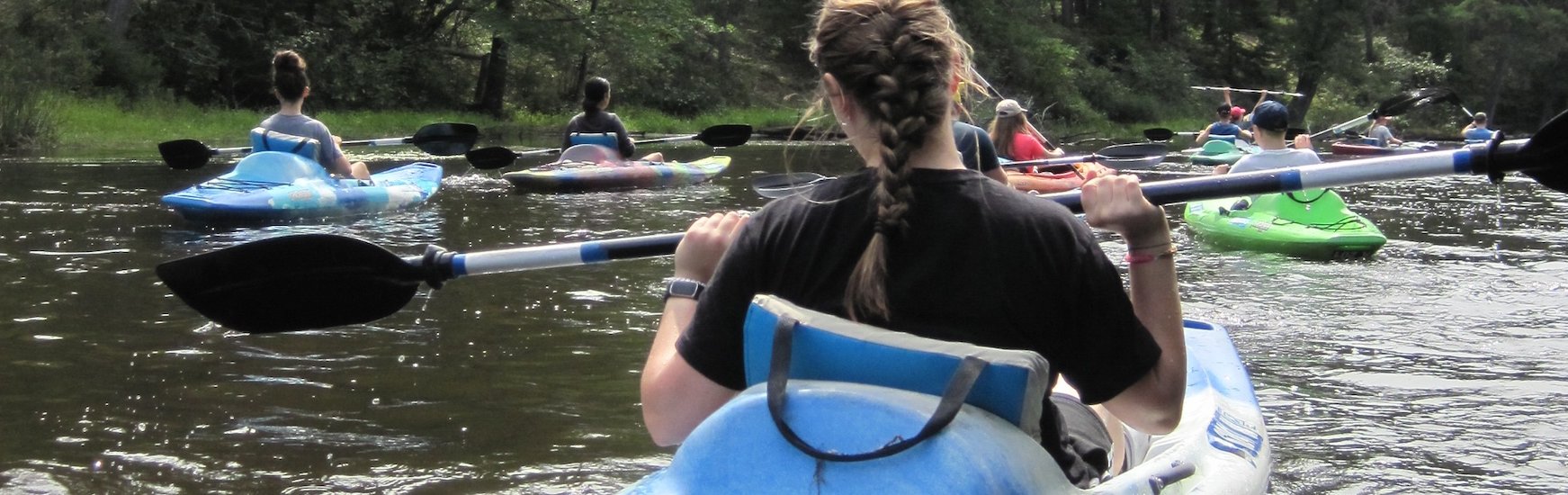 Students in kayaks