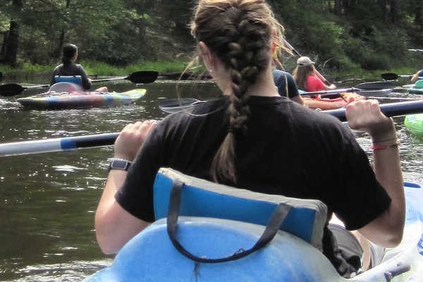 Students in kayaks